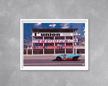 Load image into Gallery viewer, Porsche 917 Gulf Racing Reims Gueux Print - Fueled.art
