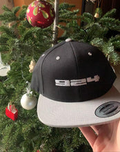 Load image into Gallery viewer, Porsche 924 - Embroidered Logo - Black &amp; Silver Snapback Hat - Fueled.art
